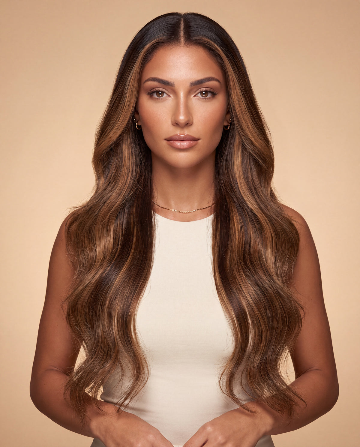 Model wearing the Valentina caramel balayage body wave wig