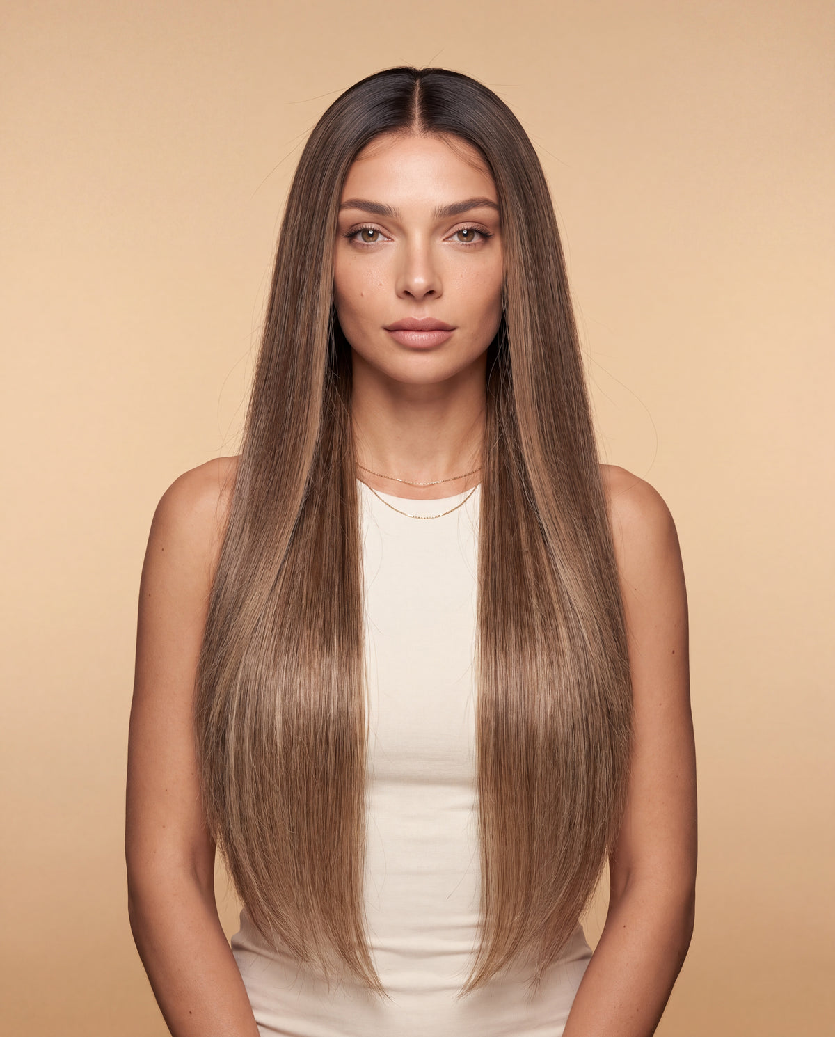 Model wearing the Celine bronde balayage straight wig